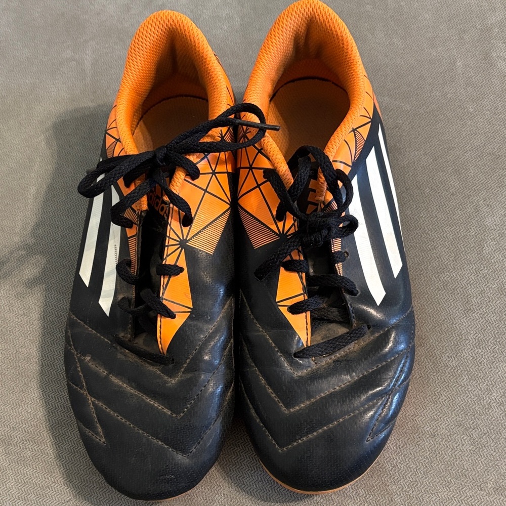 Adidas Black and Orange Soccer Cleats